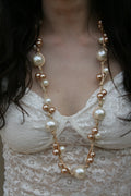 Collana lunga sfumature di perle e bronzo