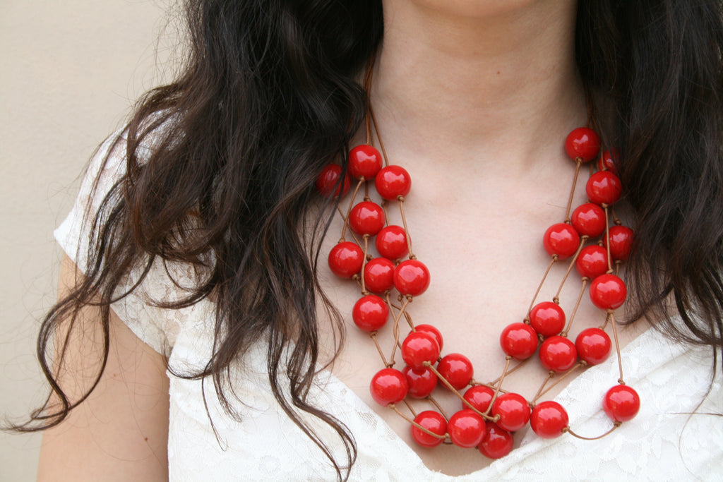 Collana Multi-Filo Rosso Corallo Dinamico
